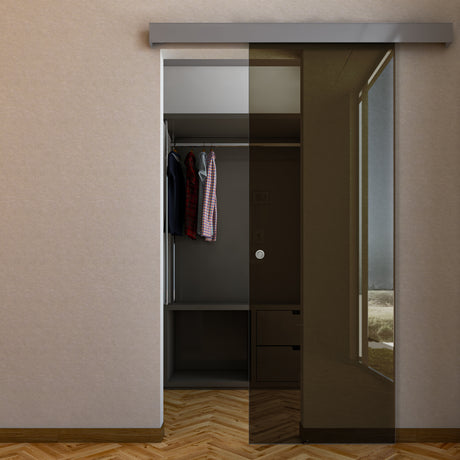 Porta con binario compact in vetro bronzato