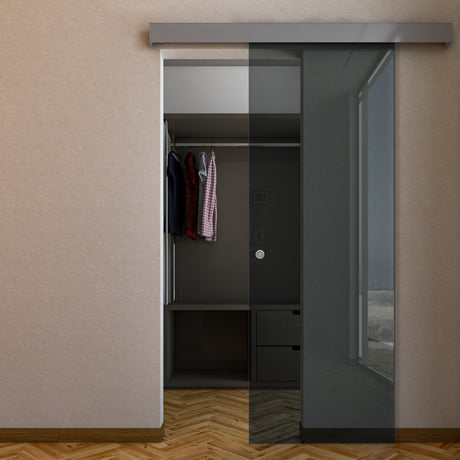 Porta con binario compact in vetro fumè